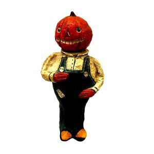 Poliwogg? Pumpkinhead American Folk Art Man Holding Doll Creepy Face 6"